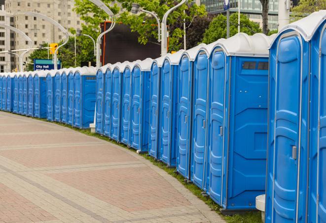 portable restrooms lined up at a marathon, ensuring runners can take a much-needed bathroom break in Brownsville